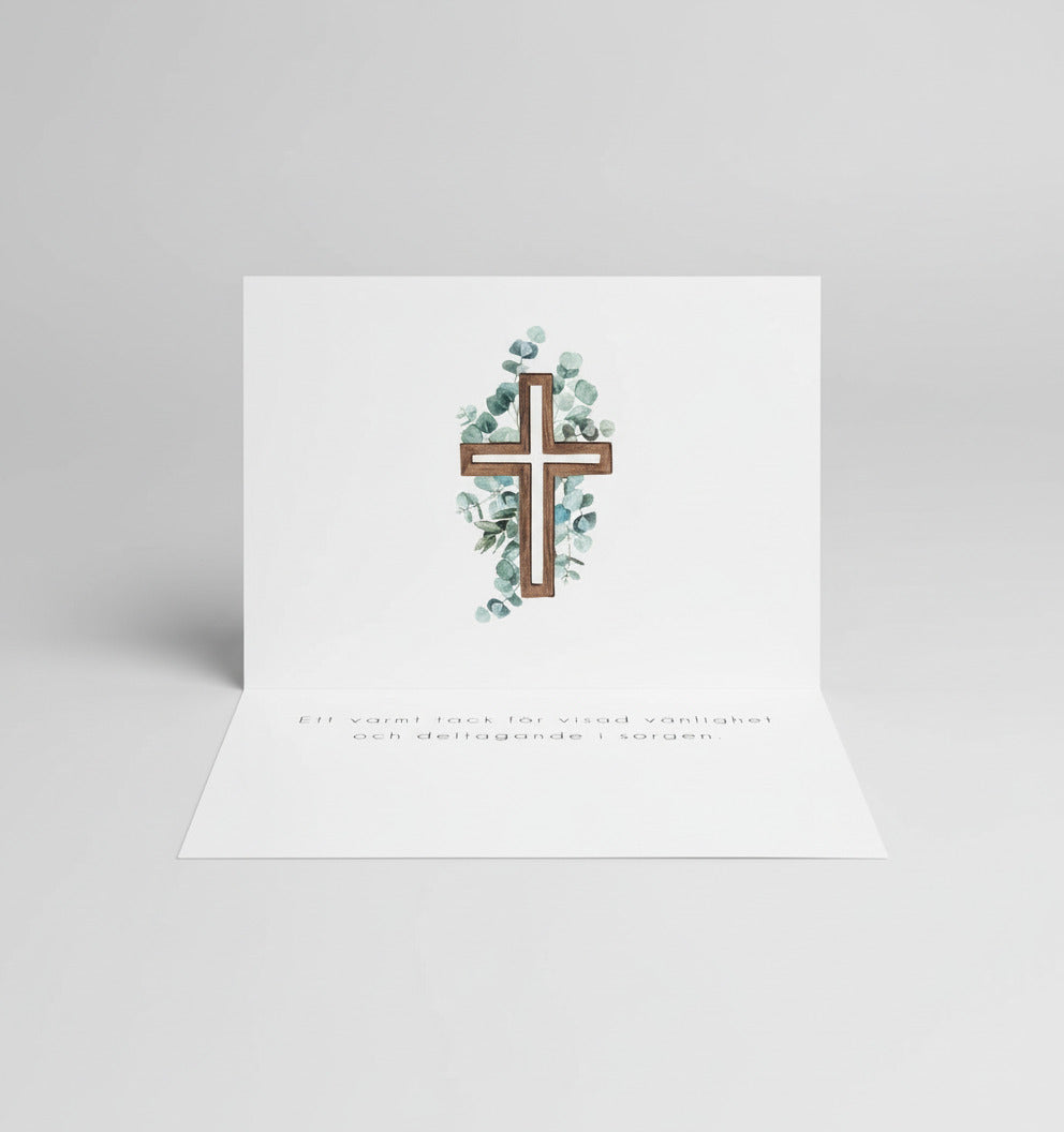 Färdiga tackkort till efter begravningen med motiv av eucalyptus på kors i akvarell. 10 kort inklusive kuvert.