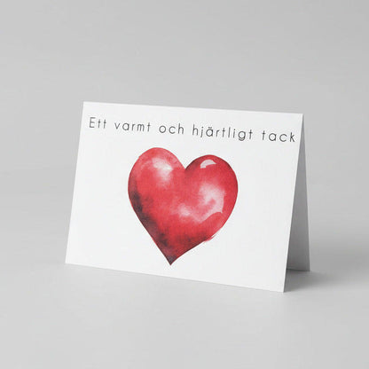 Färdiga tackkort till efter begravningen med motiv av rött hjärta. 10st inklusive kuvert.